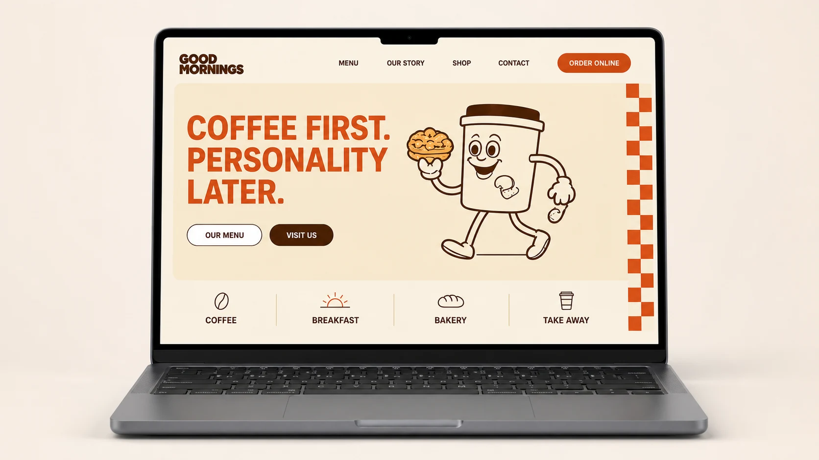 GOOD MORNINGS café website shown on a laptop